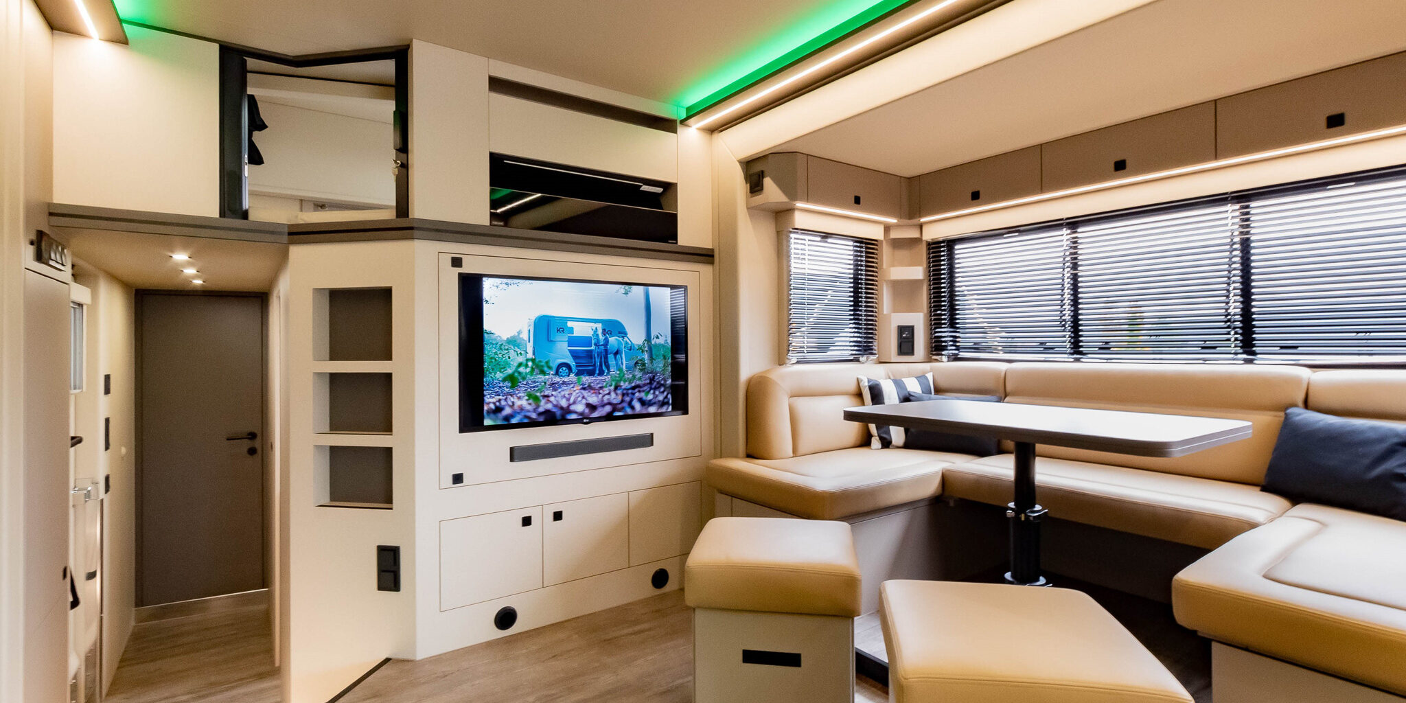 Living area in a Krismar Exclusive in bronze-colored materials combined with matte black details.