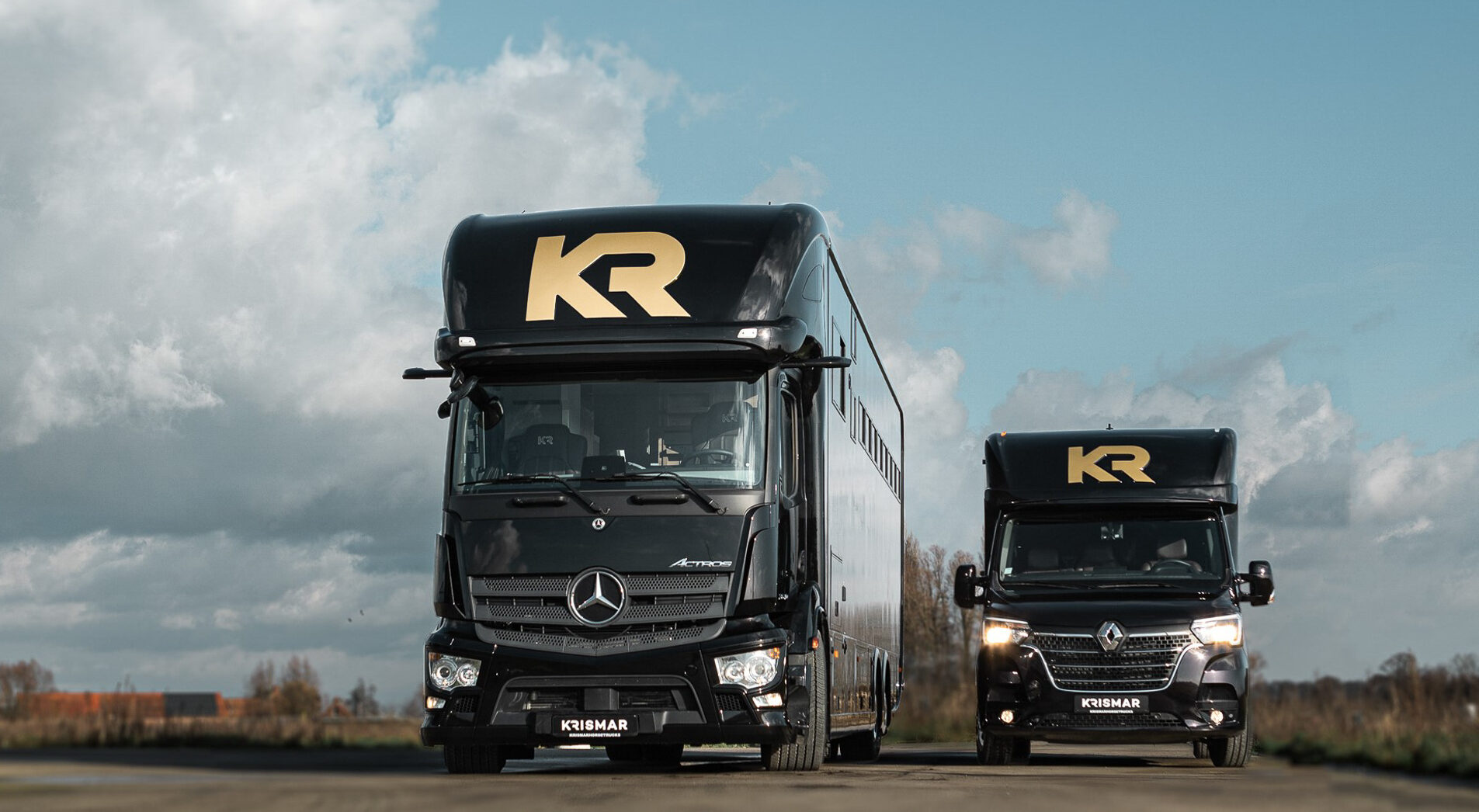 A black horse truck and 2-horse, both with a golden KR-logo on top.